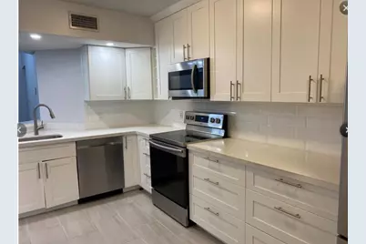 9055 Wiles Road #307, Coral Springs, FL 33067 - Photo 4