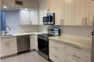 9055 Wiles Rd, Coral Springs, FL 33067 - Photo 4