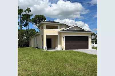 879 Sunrise Boulevard, Lehigh Acres, FL 33974 - Photo 2