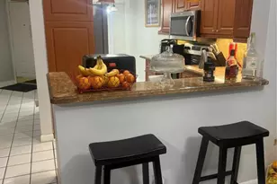 7081 Woodmont Way, Tamarac, FL 33321 - Photo 8