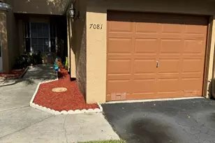7081 Woodmont Way, Tamarac, FL 33321 - Photo 2