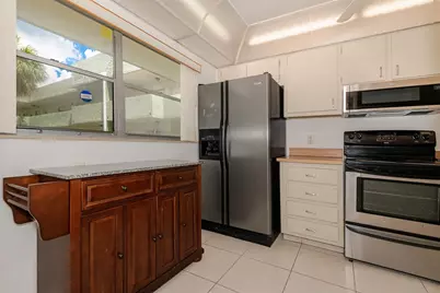 6075 N Sabal Palm Boulevard #204, Tamarac, FL 33319 - Photo 1