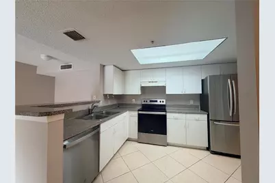 5025 Wiles Road #101, Coconut Creek, FL 33073 - Photo 2