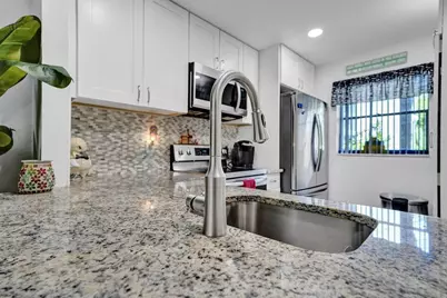 3060 Holiday Springs Boulevard #106, Margate, FL 33063 - Photo 2