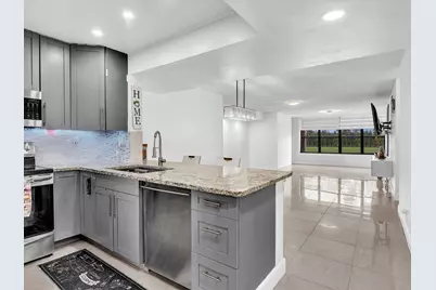 2659 N Carambola Circle #106, Pompano Beach, FL 33066 - Photo 2