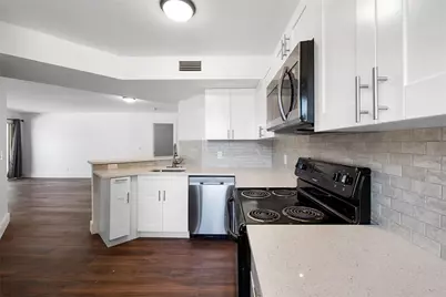 8851 Wiles Road #202, Coral Springs, FL 33067 - Photo 1