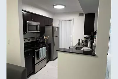 2425 NW 33rd Street #1305, Oakland Park, FL 33309 - Photo 1