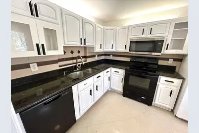 7931 Southgate Boulevard #E8, North Lauderdale, FL 33068 - Photo 1