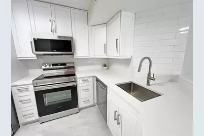 9055 Wiles Road #208, Coral Springs, FL 33067 - Photo 6