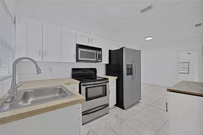 1114 NW 39th Street, Miami, FL 33127 - Photo 6