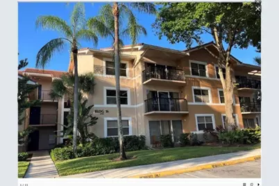 8701 Wiles Road #203, Coral Springs, FL 33067 - Photo 1