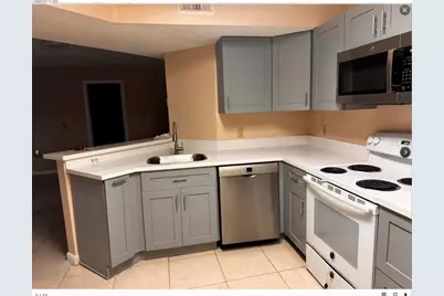 8701 Wiles Road #203, Coral Springs, FL 33067 - Photo 2