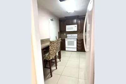 10777 W Sample Road #418, Coral Springs, FL 33065 - Photo 4