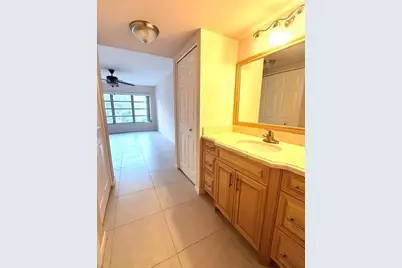 10777 W Sample Road #418, Coral Springs, FL 33065 - Photo 14