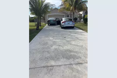 944 SW Delrio Boulevard, Port Saint Lucie, FL 34953 - Photo 1