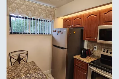 112 Lake Emerald Drive #208, Oakland Park, FL 33309 - Photo 6