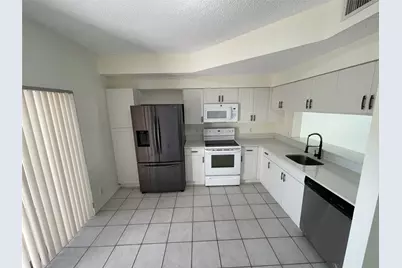 9844 NW 56th Place, Coral Springs, FL 33076 - Photo 1