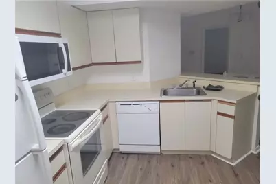 8741 Wiles Road #305, Pompano Beach, FL 33067 - Photo 4