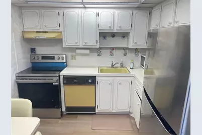 1025 Country Club Drive #302, Margate, FL 33063 - Photo 2