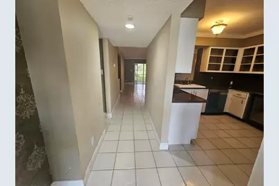 2214 S Cypress Bend Drive #105, Pompano Beach, FL 33069 - Photo 2