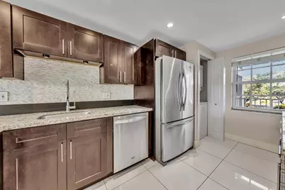 3520 Oaks Way #306, Pompano Beach, FL 33069 - Photo 6