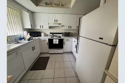 11183 NW 7th Street #202, Miami, FL 33172 - Photo 1