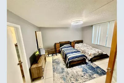 6190 Woodlands Boulevard #107, Tamarac, FL 33319 - Photo 8