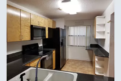 430 Commodore Drive #210, Plantation, FL 33325 - Photo 1