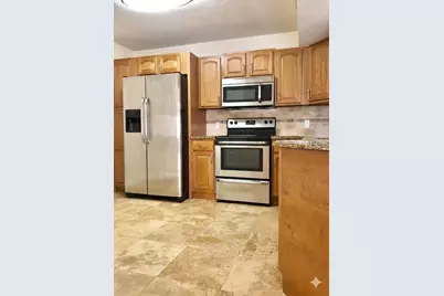 8721 Wiles Road #104, Coral Springs, FL 33067 - Photo 2