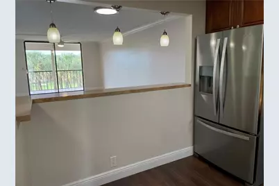 2460 Deer Creek Country Club Boulevard #408-A, Deerfield Beach, FL 33442 - Photo 6