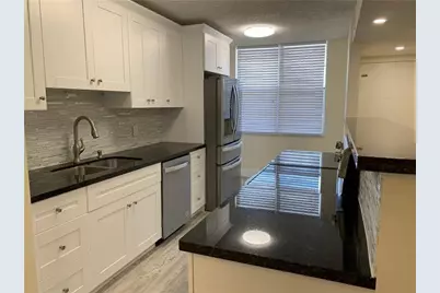 250 Jacaranda Drive #203, Plantation, FL 33324 - Photo 2