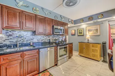 3520 Oaks Way #809, Pompano Beach, FL 33069 - Photo 12