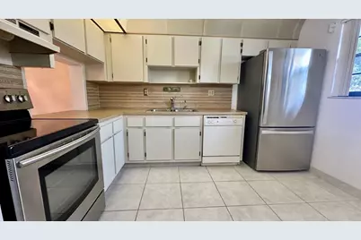 6090 N Sabal Palm Boulevard #108, Tamarac, FL 33319 - Photo 1