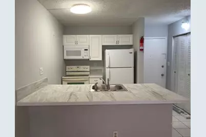 2701 Riverside Drive #107B, Coral Springs, FL 33065 - Photo 1