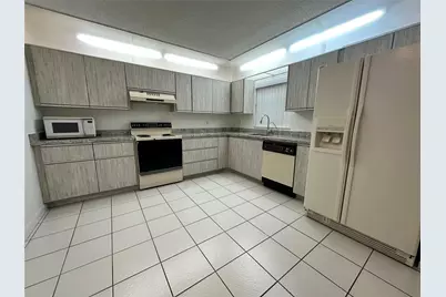 9633 Riverside Drive #E-3, Coral Springs, FL 33071 - Photo 2