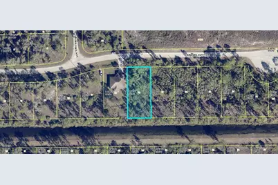 1054 Candlelight Drive, Lehigh Acres, FL 33974 - Photo 1