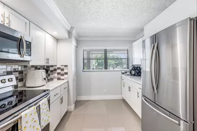 12926 Briarlake Drive #201, Palm Beach Gardens, FL 33418 - Photo 4