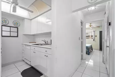 419 Golden Isles Drive #107, Hallandale Beach, FL 33009 - Photo 16