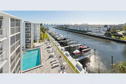 108 Paradise Harbour Boulevard #107, North Palm Beach, FL 33408 - Photo 1