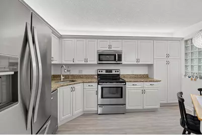 5275 Europa Drive #H, Boynton Beach, FL 33437 - Photo 1