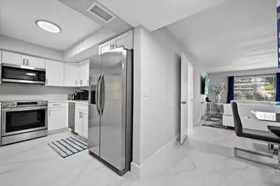 5500 Tamberlane Circle #105, Palm Beach Gardens, FL 33418 - Photo 4