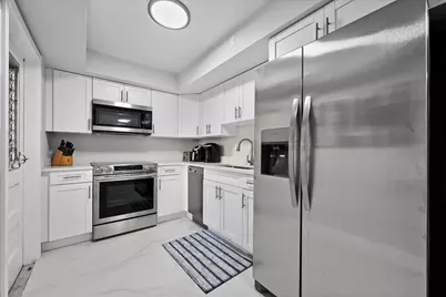 5500 Tamberlane Circle #105, Palm Beach Gardens, FL 33418 - Photo 2