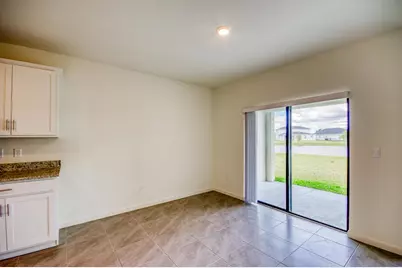 9767 SW Triton Way, Port Saint Lucie, FL 34987 - Photo 8