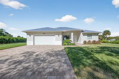 8249 SE Dharlys Street, Hobe Sound, FL 33455 - Photo 1