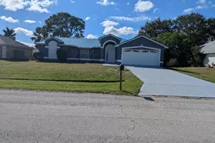 1122 SE Puritan Ln, Port Saint Lucie, FL 34983 - Photo 1