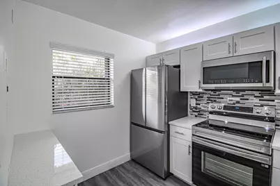 7094 Golf Colony Court #102, Lake Worth, FL 33467 - Photo 4