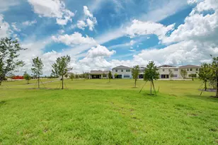 1366 Harvester Xing, The Acreage, FL 33470 - Photo 48