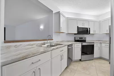 800 Uno Lago Drive #102, Juno Beach, FL 33408 - Photo 1