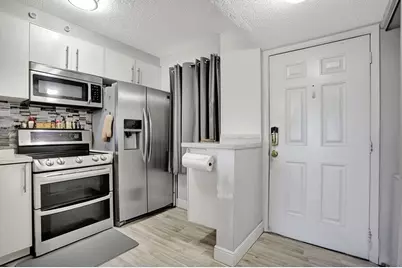 2216 N Cypress Bend Drive #501, Pompano Beach, FL 33069 - Photo 2