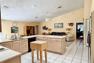 2884 SE Ranch Acres Cir, Jupiter, FL 33478 - Photo 12